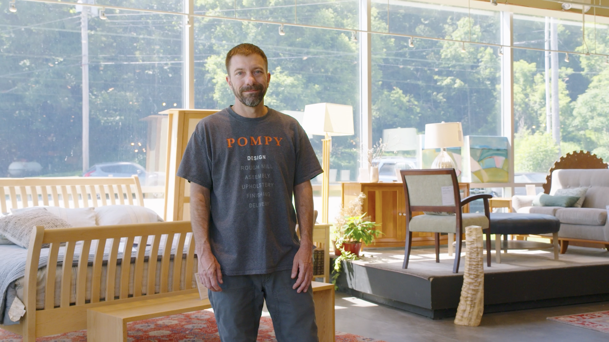 Lucas Stepno standing in the Thetford, VT Showroom